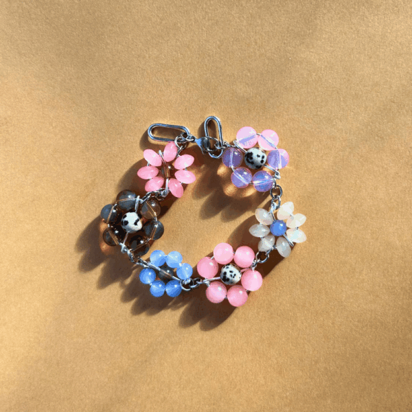 Bransoletka z plecionych kwiatków - brąz, róż, błękit, jaspis dalmatyński