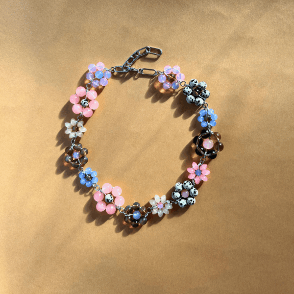 Naszyjnik z plecionych kwiatków - brąz, róż, błękit, jaspis dalmatyński